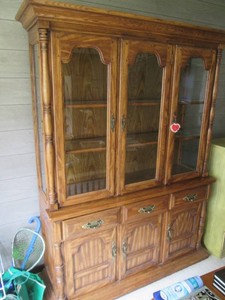 High quality Wood China Hutch display cabinet with carved details throughout, glass door fronts and interior shelves, drawers and cupboard style door storage approx 56x18x77in