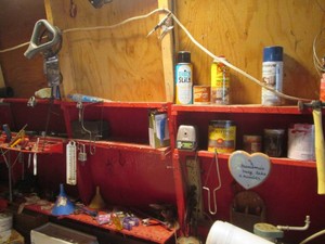 Content of workspace wall to include various hand tools, paint supplies, hardware and other misc shown in pics