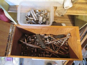 Wooden tool box with various 14in, 38in and 12in drive tools and accessories including a mixture of SAE and metric deep and shallow sockets, extensions, adapters, reducers, ratchets and breaker bar
