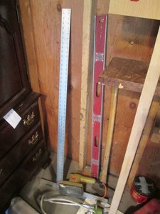 Construction square, level, splitting maul, sander and misc shown in pics