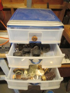 3-drawer and 4-drawer plastic organizers with assorted door hardware, caster wheels, replacement automotive bulbs and more