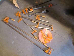 Collection of assorted size bar clamps, propane regulator and Reflective stripping