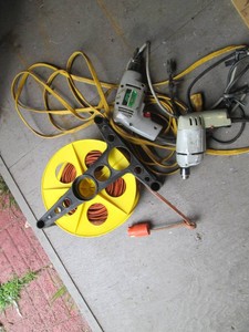 Electric drills, extension cord reel and assorted extension cords