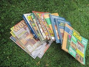 Stack of woodworking books and magazines