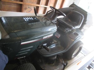 Fantastic Craftsman LT-1000 riding lawnmower with Kohler 16ohv motor, forward and reverse gears, good tires, heavy duty 12ga 42in cutting deck and complete bagger attachment