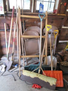 Trailer jack, metal folding chairs, shovel variety, rakes and other yard warrior tools