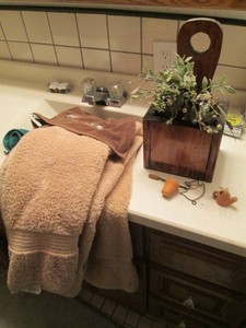 Hand and bath towels, wood planter box, artificial greenery with tin, mini garden pottery decor and dust beater and more