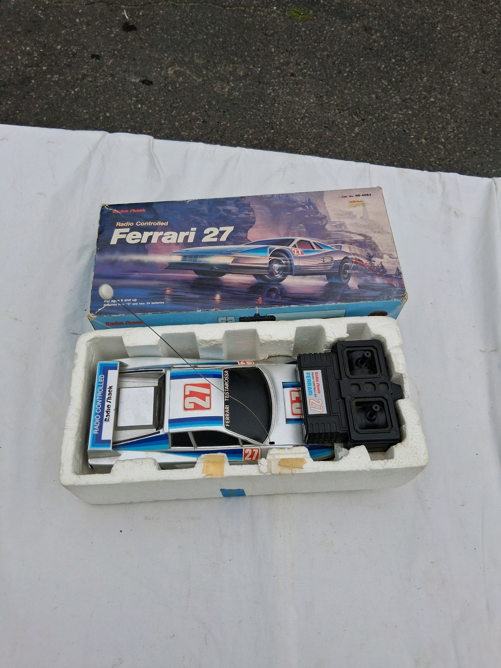LATE 1980S OR EARLY 90S REMOTE CONTROL RACE CAR IN THE BOX