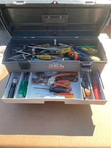 GREY TOOLBOX WITH AN ASSORTMENT OF TOOLS