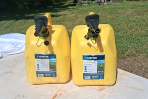 2 DIESEL CANS WITH THE TAGS ON THEM