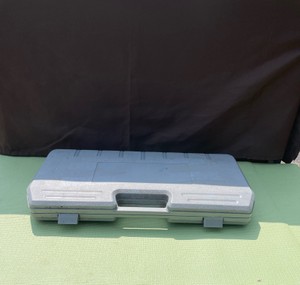 GRAY CASE WITH MISCELLANEOUS ITEMS
