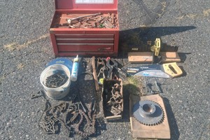 RED METAL TOOLBOX WITH LARGE ASSORTMENT OF TOOLS