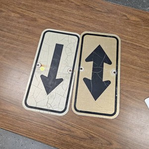 Pair of Arrow Direction Signs