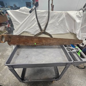 Ice Tongs and Hand Saw as Pictured