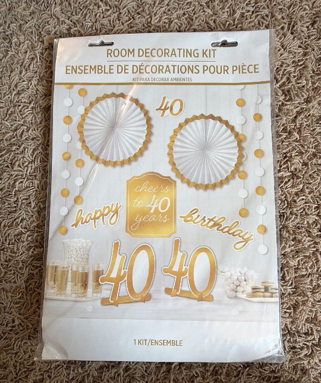 Cheers to 40 room decorating kit  great for 40th birthday party or 40th anniversary  7 feet of gold and white string decorations  two table centerpieces  two paper fan decorations  four paper cut outs.