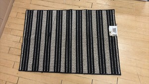 Indoor Rug Black and Tan 30 inches by 45 inches, light yarn fray, easily fixable