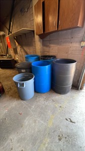 PLASTIC TRASH BARRELS