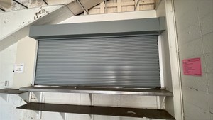 ATLAS ROLL UP SNACK BAR  WINDOW AND STAINLESS STEEL COUNTER TOP