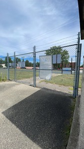 CENTURY FENCE CHAIN LINK FENCE SECTION AND A GATE