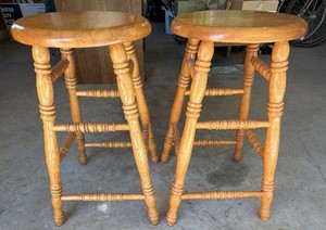 2 wooden barstools