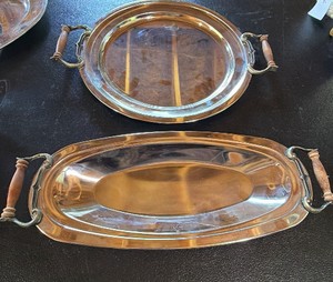 2 Kromex serving trays