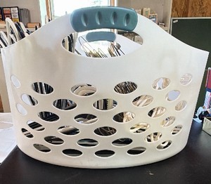 Laundry basket with assorted hangers