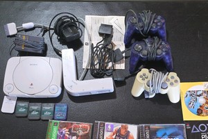 Sony PS one Slim Console Bundle w DualShock Controller, Multi-Tap, 5 Memory Cards & 7 Games