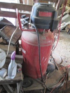 Craftsman 33-gallon upright air compressor with hose (builds pressure but doesnt hold due to leak)