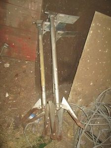 Trio of metal camper stabilization jacks