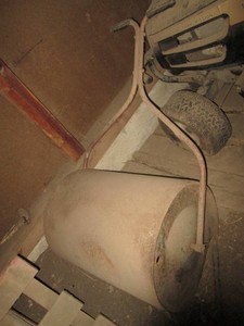 Metal tank manually operated sod roller