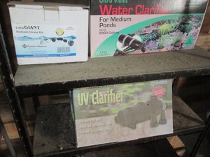 Outdoor pond water clarifiers and bottom drain kit