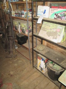 Pair of metal multi-tier storage shelves approx 3ftx13inx5ft