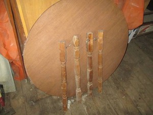 Vintage 38in round wood unassembled spindle leg dining table