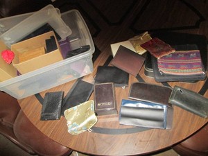Wide variety of coin purses, wallet and other travel containments