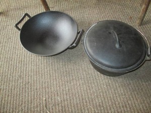 Cast iron Dutch oven and wok style pan