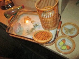 Butterfly themed coasters and serving tray set, misc stones and Ship in a glass bottle decor