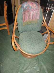 Wicker egg style captains swivel rocking chair with padded cushions