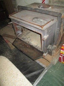 Super heavy and efficient wood burning stove insert with cast iron doors