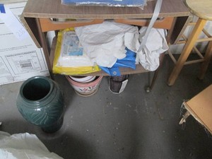 Vintage laminate rolling drop leaf entry table with underneath storage area, misc tarps and planters