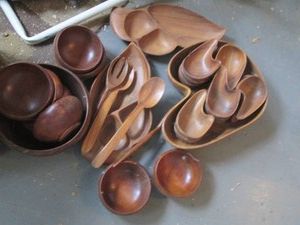 Huge collection of wood serving platters, bowls and utensils