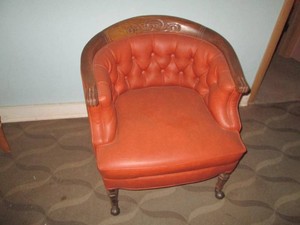 (4) Vintage rolling leather clawfoot style barrel club chairs
