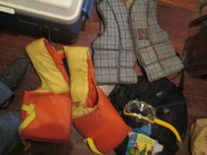 Live jackets, water shoes, snorkeling gear and netted floating device