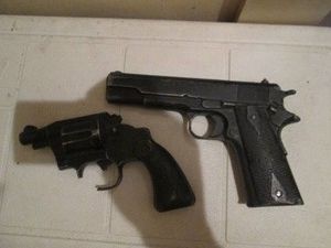 Realistic looking pistol and revolver training tool prop weapons