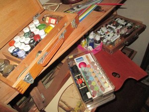 Misc paints, brushes, easel, wall decor and other art supplies