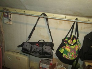 Suitcase, Bucket Boss tool bag and other misc travel bags