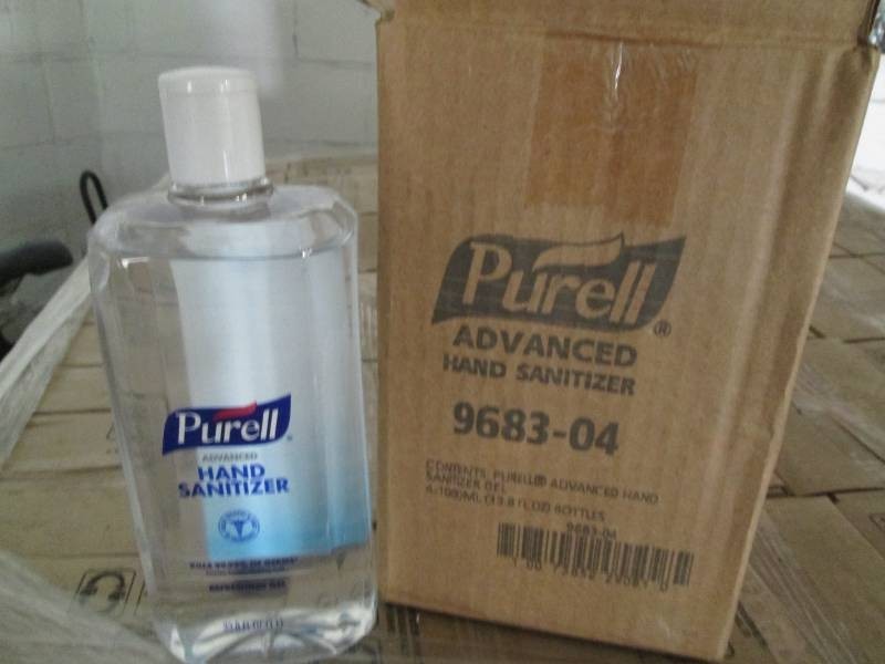 4 33.8 Oz Purell hand sanitizer gel bottles