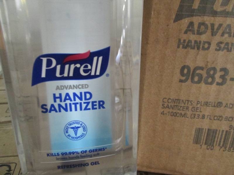 4 33.8 Oz Purell hand sanitizer gel bottles