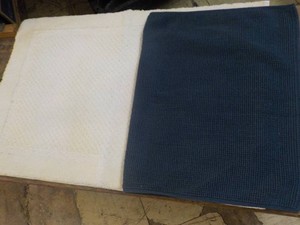 2 Bath Rugs - slight flaws as shown