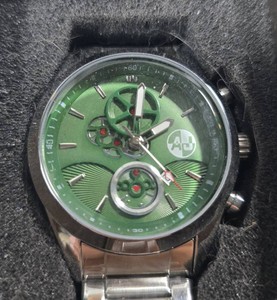 AJ Mens Stainless Steel Watch  Green Skeleton-Style Dial  New in Box