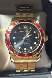 MIYKON Mens Gold-Tone Stainless Steel Watch  Black Sunburst Dial  Red Diver-Style Bezel  Japanese Movement  New in Box